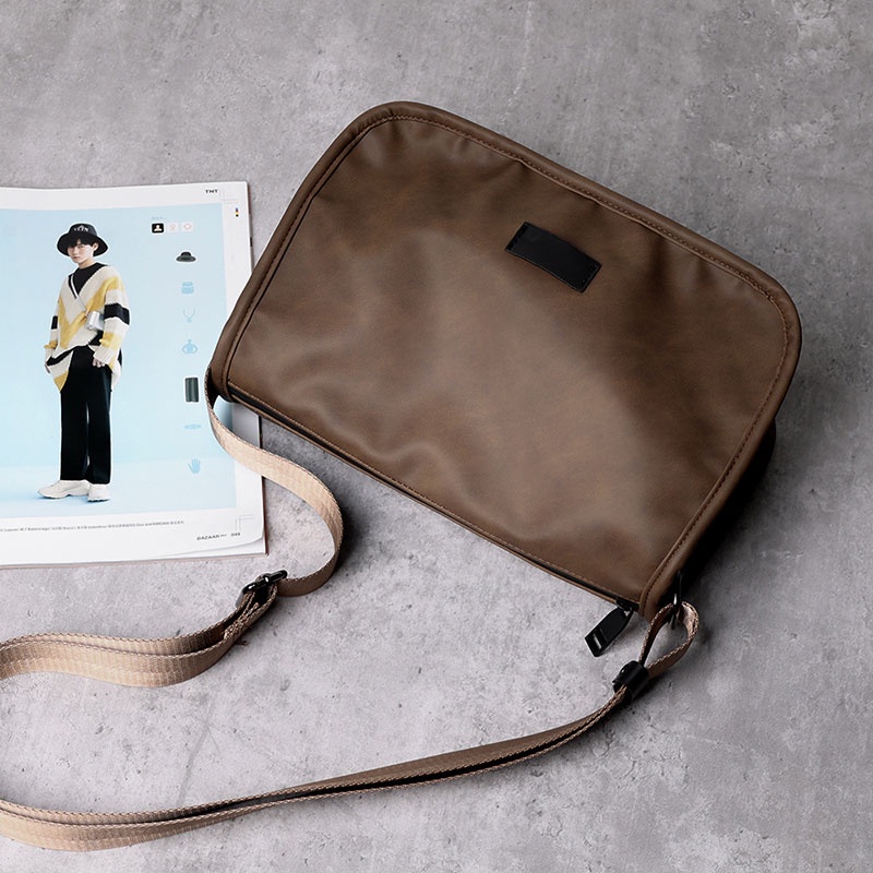 Arctic HUNTER túi xách nam xu hướng mới túi đeo vai đơn giản màu trơn Chất liệu PU mờ retro túi chéo giải trí ngoài trời phù hợp ba lô đi xe đạp