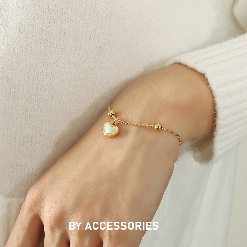 Dây chuyền titan trái tim bầu khảm xà cừ không gỉ