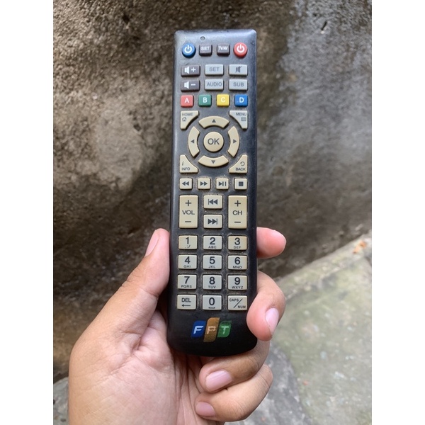 REMOTE ĐIỀU KHIỂN TRUYỀN HÌNH FPT HÀNG CHÍNH HÃNG, ĐÃ QUA SỬ DỤNG, LOẠI MÀU ĐEN, CÓ THỂ SAO CHÉP ĐƯỢC REMOTE TV SANG