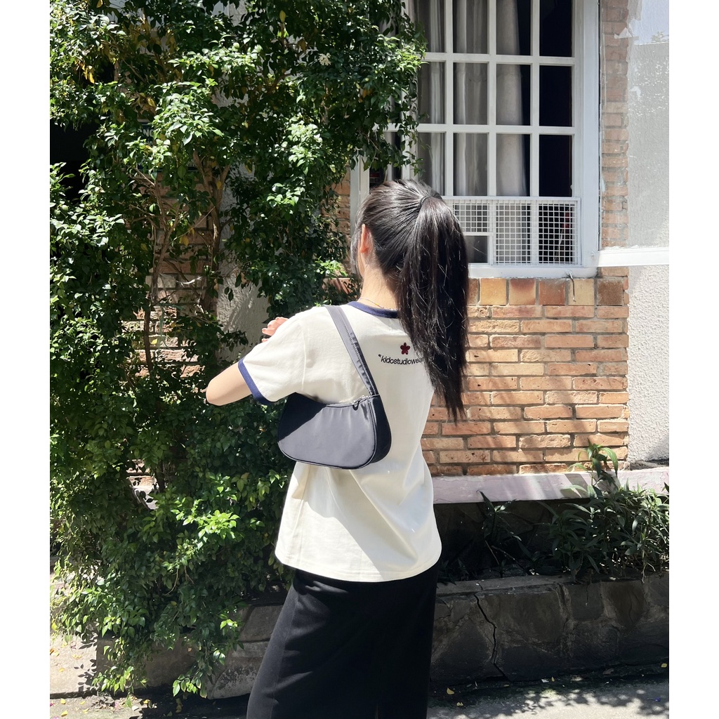 Áo thun tay ngắn cổ tròn in chữ KIDOSTUDIOWEAR