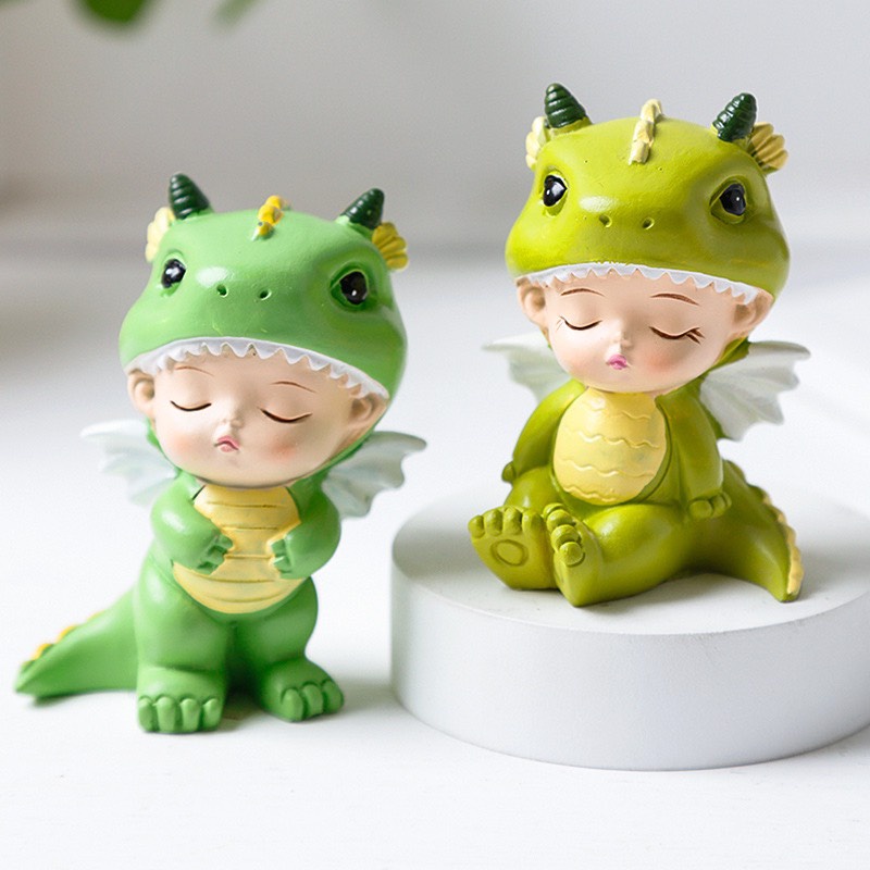 Em bé khủng long trang trí bánh sinh nhật