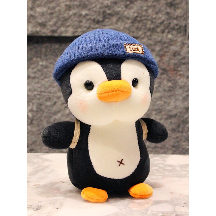Gấu bông chim cánh cụt đội mũ đeo balo quà tặng sinh nhật gấu bông cho bé _ Unishop