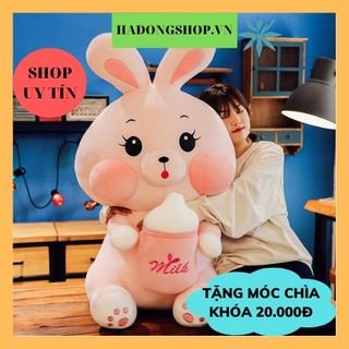 Gấu bông thỏ ôm bình sữa, thú nhồi bông thỏ hồng ôm bình sữa, gấu bông hình con thỏ hồng đáng yêu - HAUNNISHOP.VN