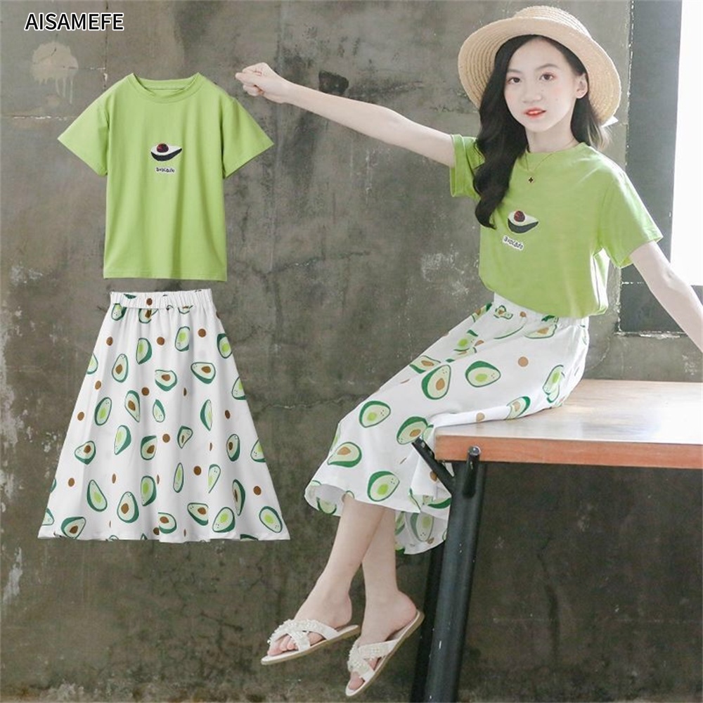 Bộ Áo Thun Cotton In Hình Quả Bơ Hoạt Hình + Chân Váy Mùa Hè Cho Bé Gái 3-12 Tuổi