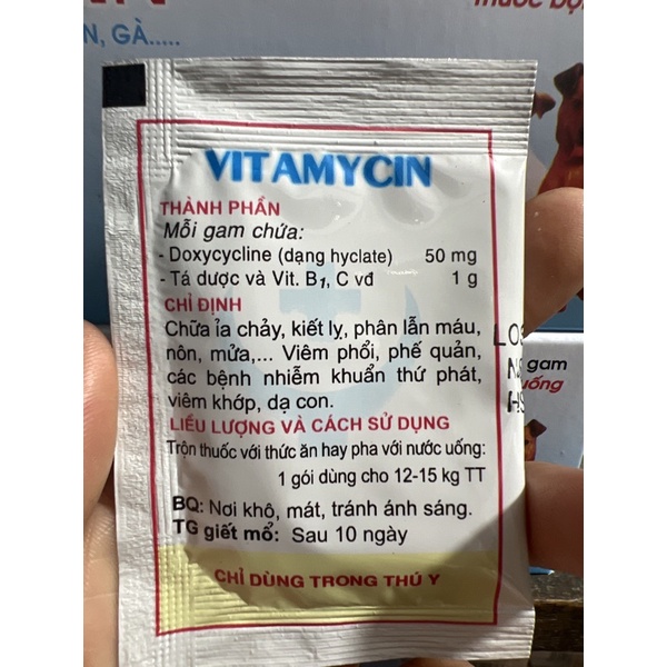 1 hộp vitamycin  dùng tốt cho chó, mèo đi ỉa, kiết lị
