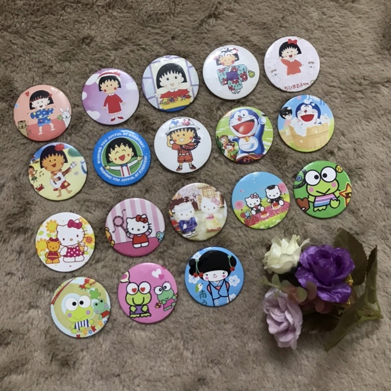Huy hiệu, pin cài cặp sách