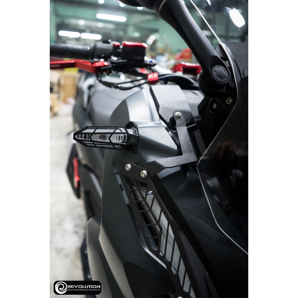 Ốp bảo vệ đèn xi nhan REVOLUTION ADV150 ADV160 ADV350 và các dòng xe có kiểu đèn như hình