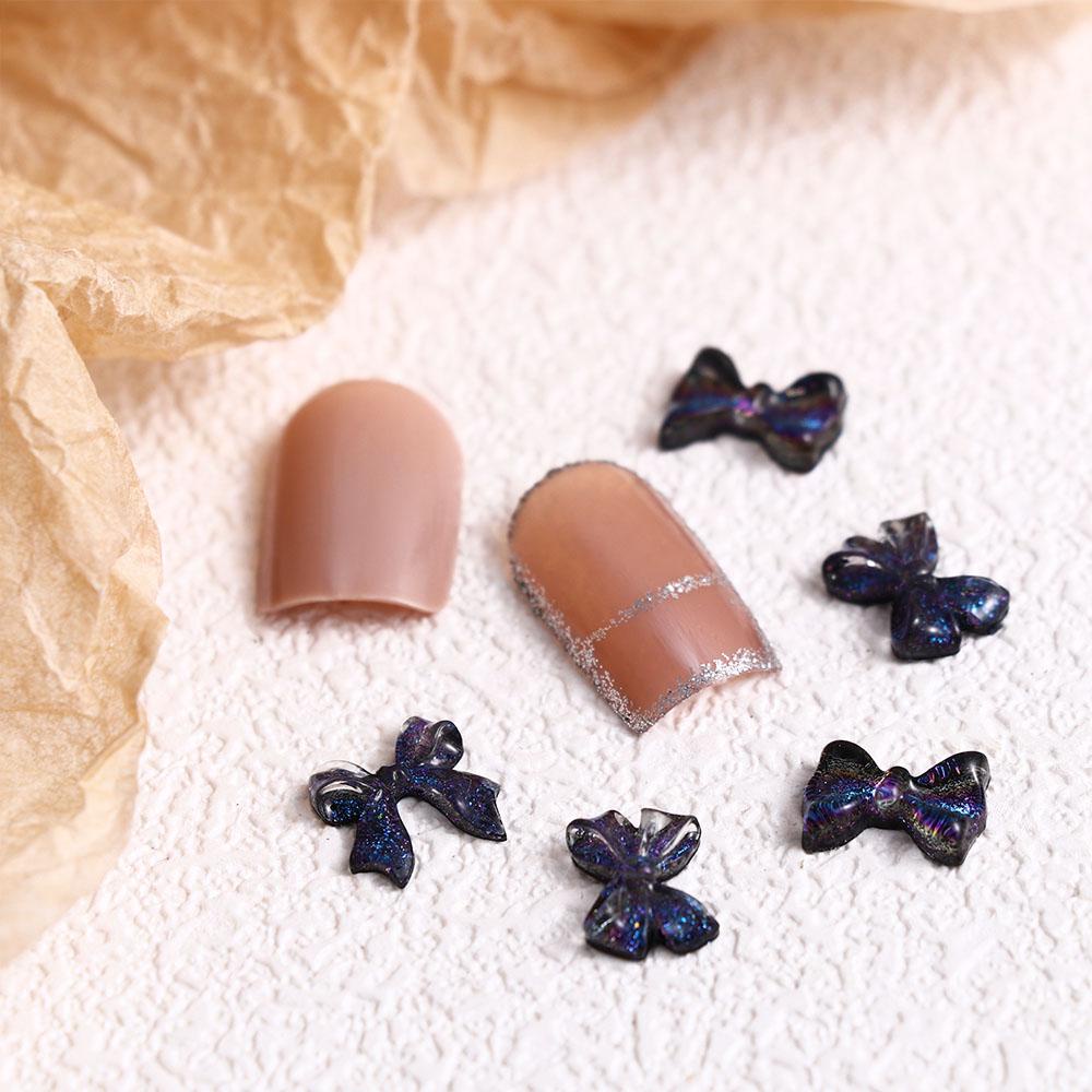 Set 50 Phụ Kiện Trang Trí Móng Tay Hình Nơ Màu Tím Phong Cách Hàn Quốc