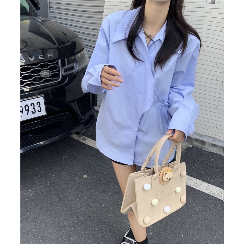 Set áo sơ mi và áo len ngoài màu xanh, hồng