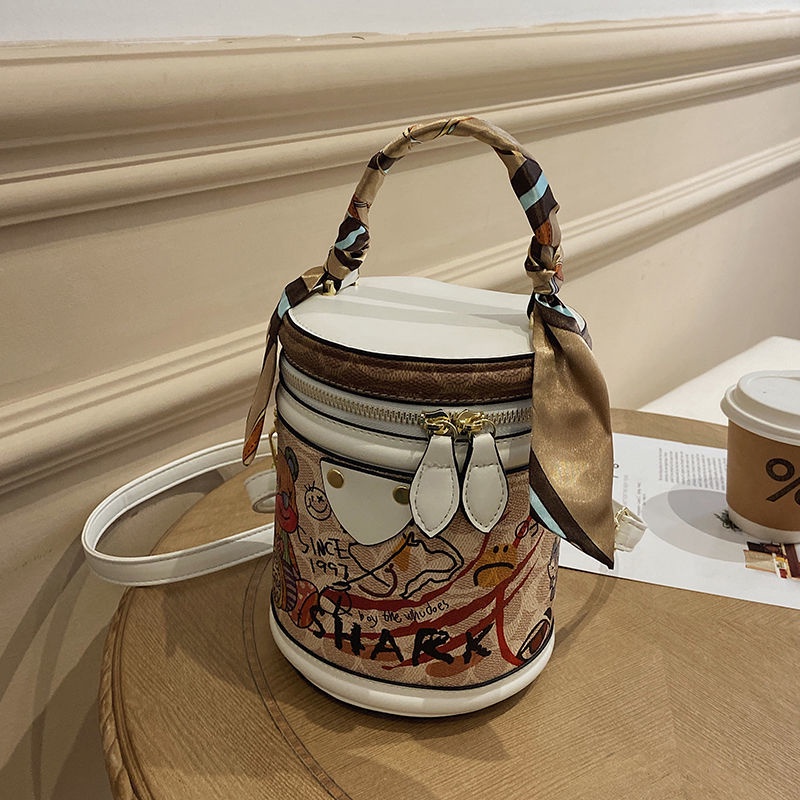 Túi Đeo Chéo Hình Trụ Họa Tiết Graffiti Thời Trang Dành Cho Nữ