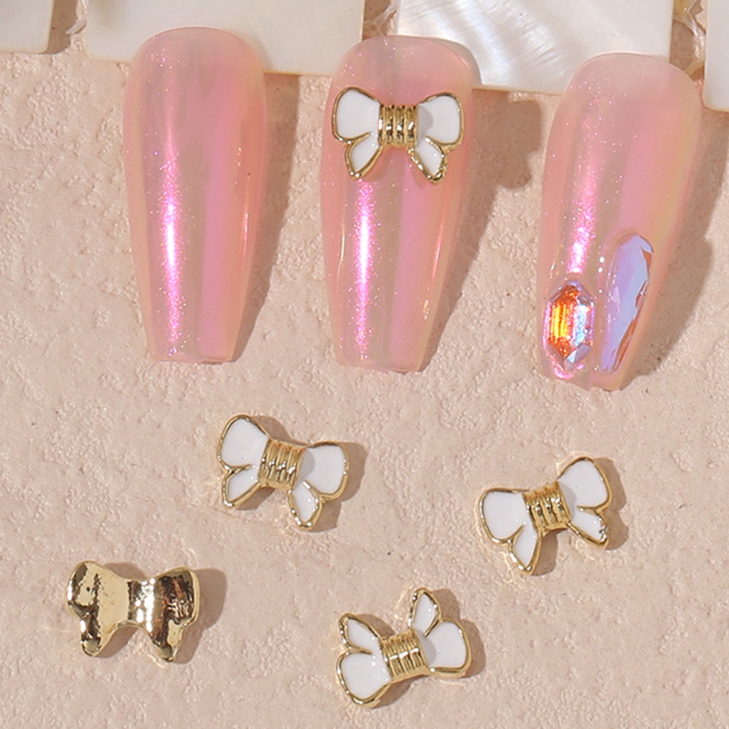 Set 10 Phụ Kiện Trang Trí Móng Tay Nghệ Thuật Bằng Hợp Kim Ba Chiều Có Hương Thơm Hình Hoa Trà / Nơ DIY