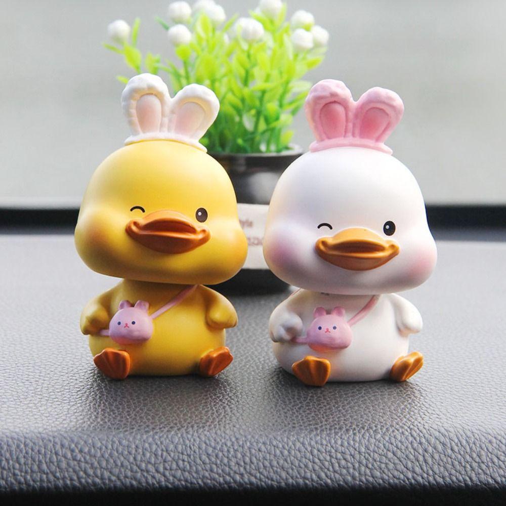 Đồ trang trí Đầu Vịt Lắc Đầu Bằng Nhựa Resin Trang Trí Nội Thất Xe Hơi REBUY1