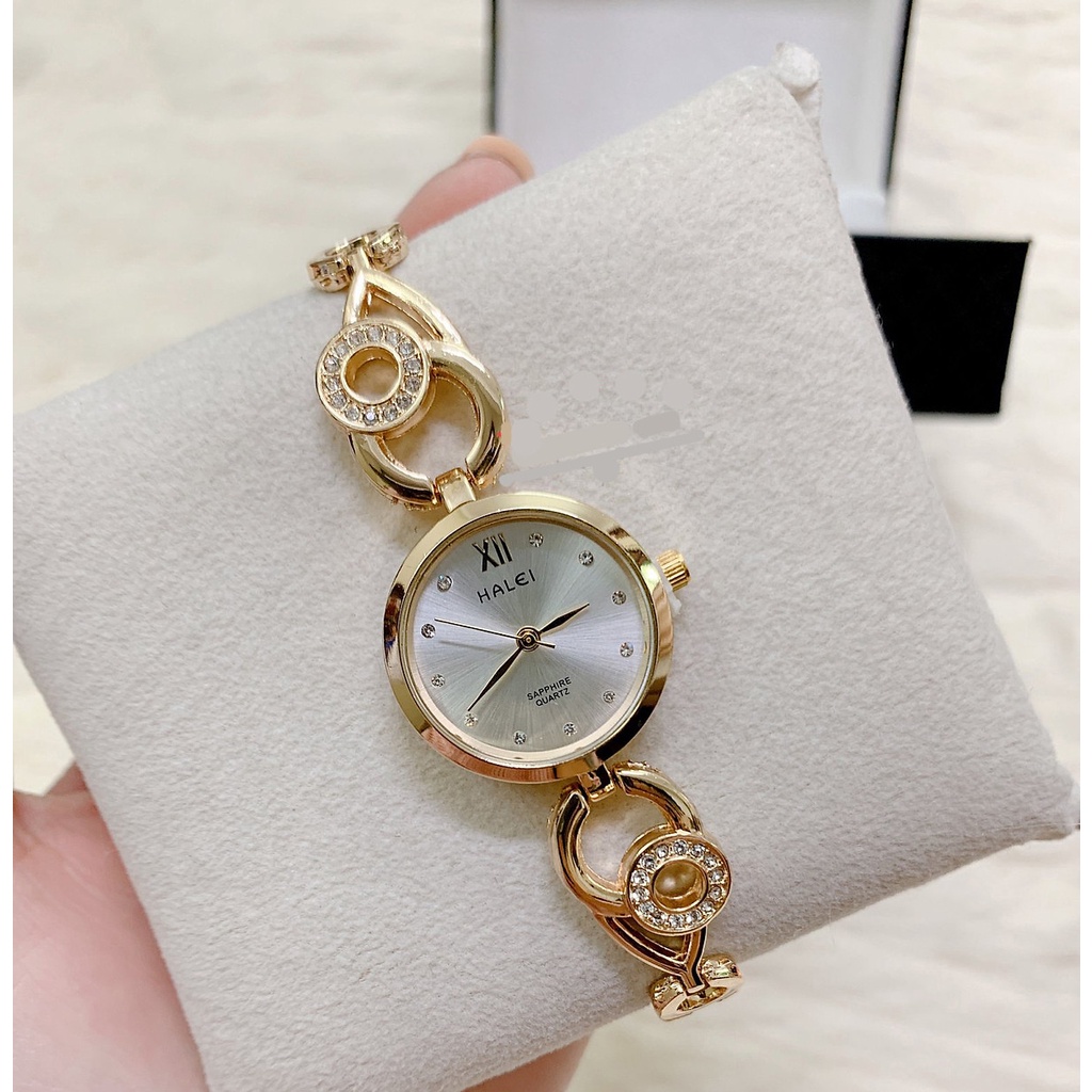 Đồng Hồ Nữ Halei Dáng Lắc Mặt Tròn Dây Vàng Mặt Trắng