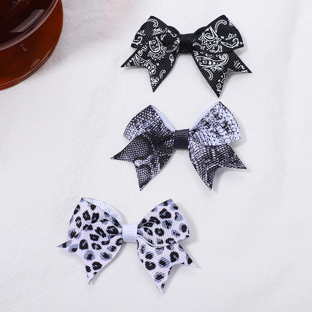 KIDSBOWS Set 5 / 10 / 20 Kẹp Tóc Nơ Họa Tiết Da Báo Dễ Thương Cho Bé Gái