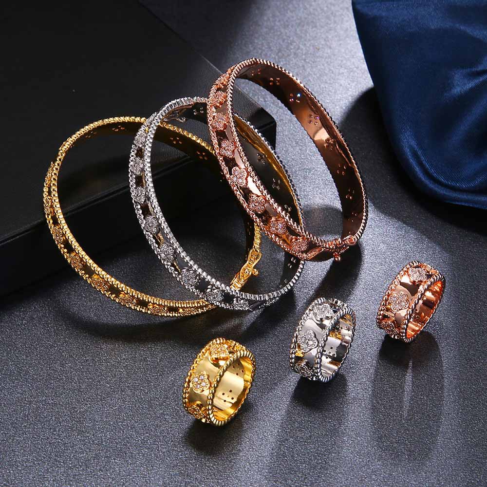 Bộ Trang Sức Nhẫn Và Vòng Tay Bằng Kim Loại Họa Tiết Hoa Thời Trang Chất Lượng Cao Làm Đẹp Cho Nữ
