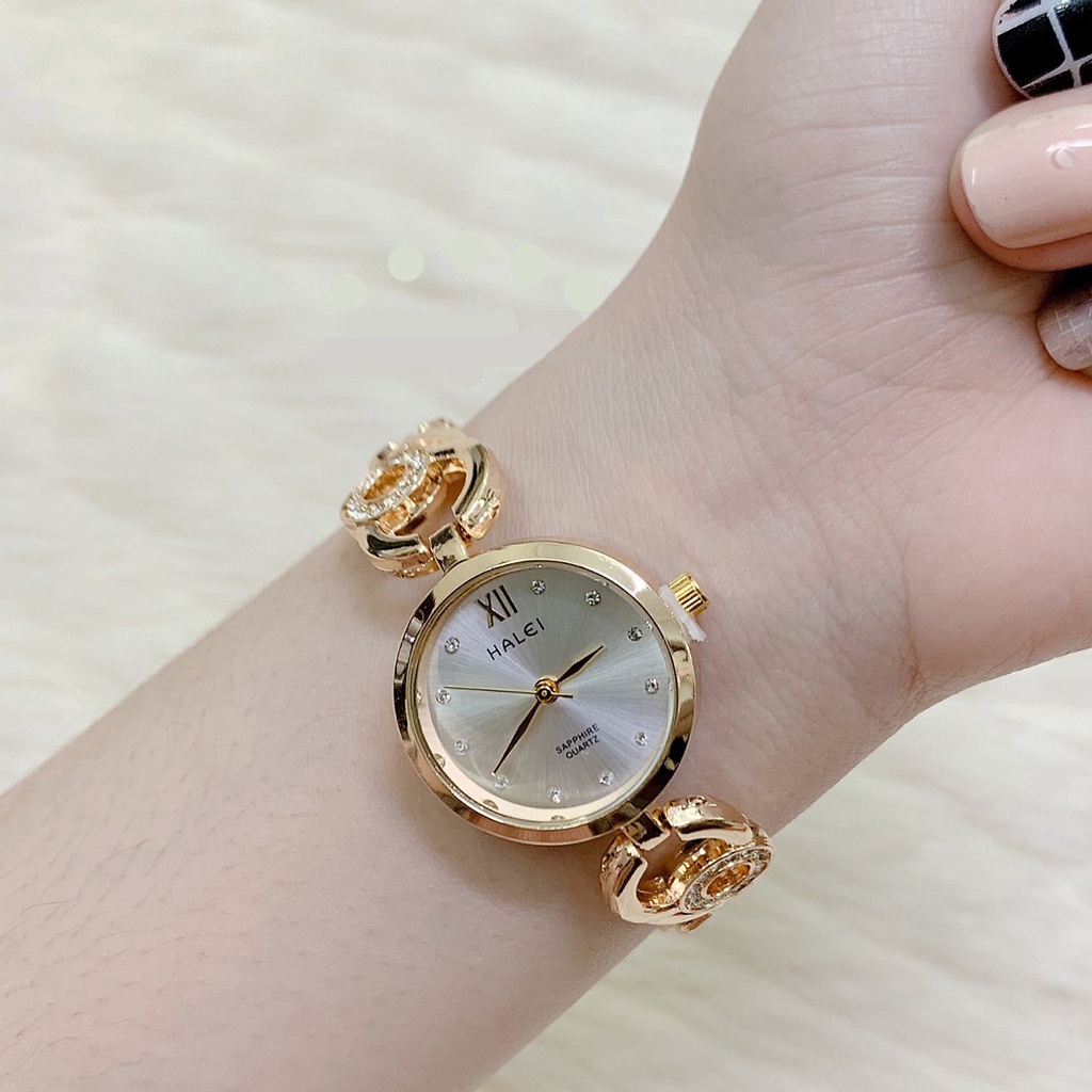 Đồng Hồ Nữ Halei Dáng Lắc Mặt Tròn Dây Vàng Mặt Trắng