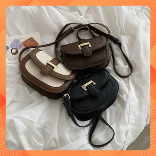 Túi đeo chéo nữ đẹp dáng bầu khuy gài chữ h