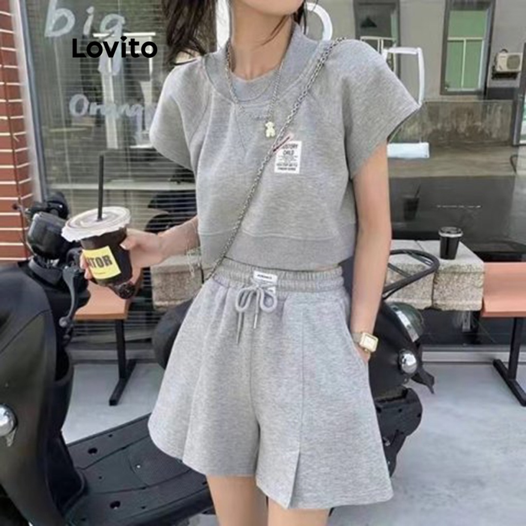 Set áo tay ngắn cổ tròn xẻ tà phối vá + quần short Lovito màu trơn phong cách Preppy cho nữ LNL03047 (màu xám/ hồng/ xanh dương)