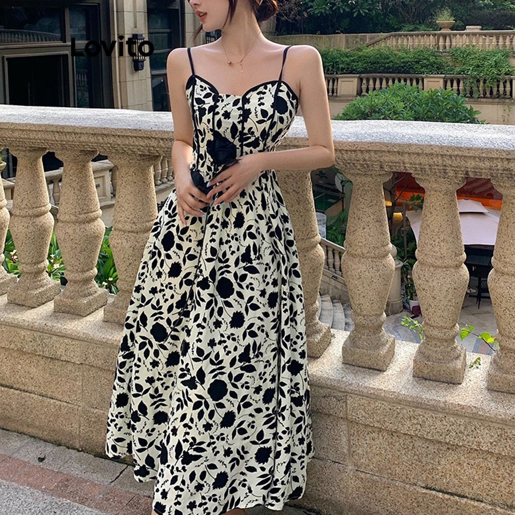 Đầm midi Lovito dáng xòe phối dây tương phản không tay họa tiết hoa cơ bản cho nữ LNE02211 (màu trắng)