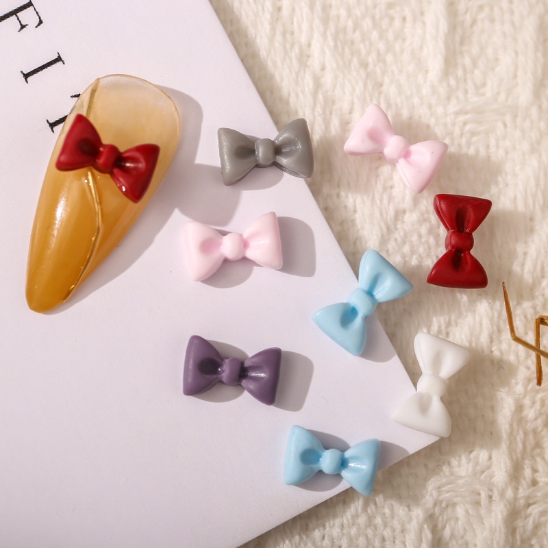 Set 50 Phụ Kiện Nơ Nhiều Màu Trang Trí Móng Tay / Ốp Điện Thoại