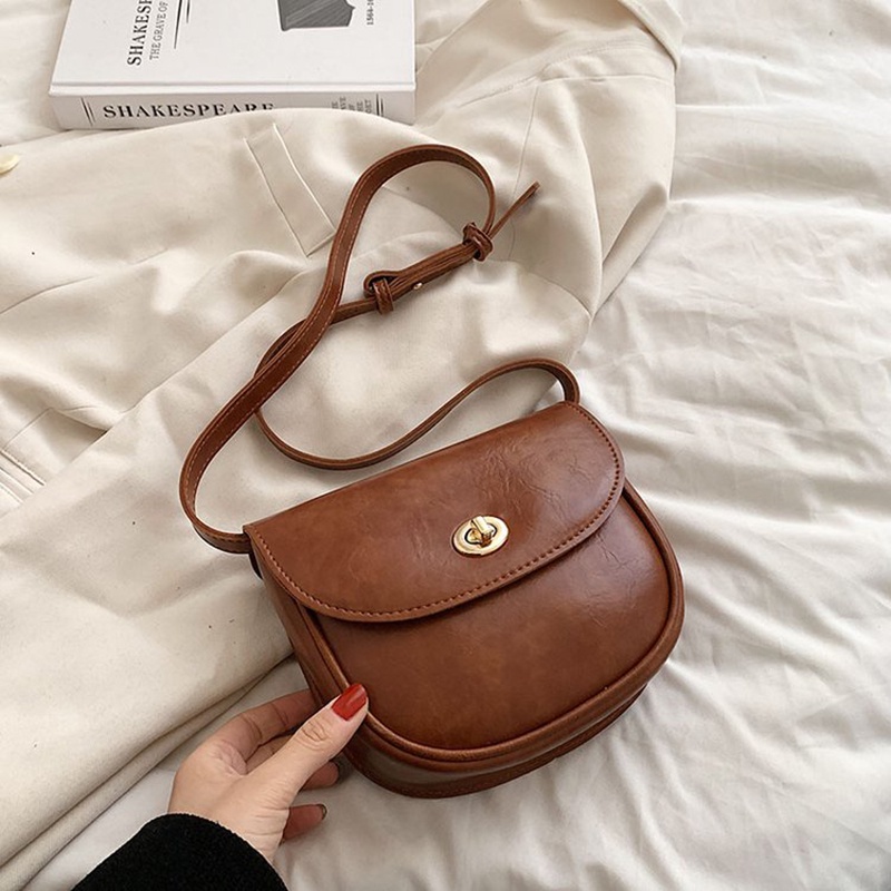 Túi Đeo Chéo Khóa Tròn Nhỏ Thiết Kế Đa Năng Tinh Tế Màu Vàng Cho Nữ