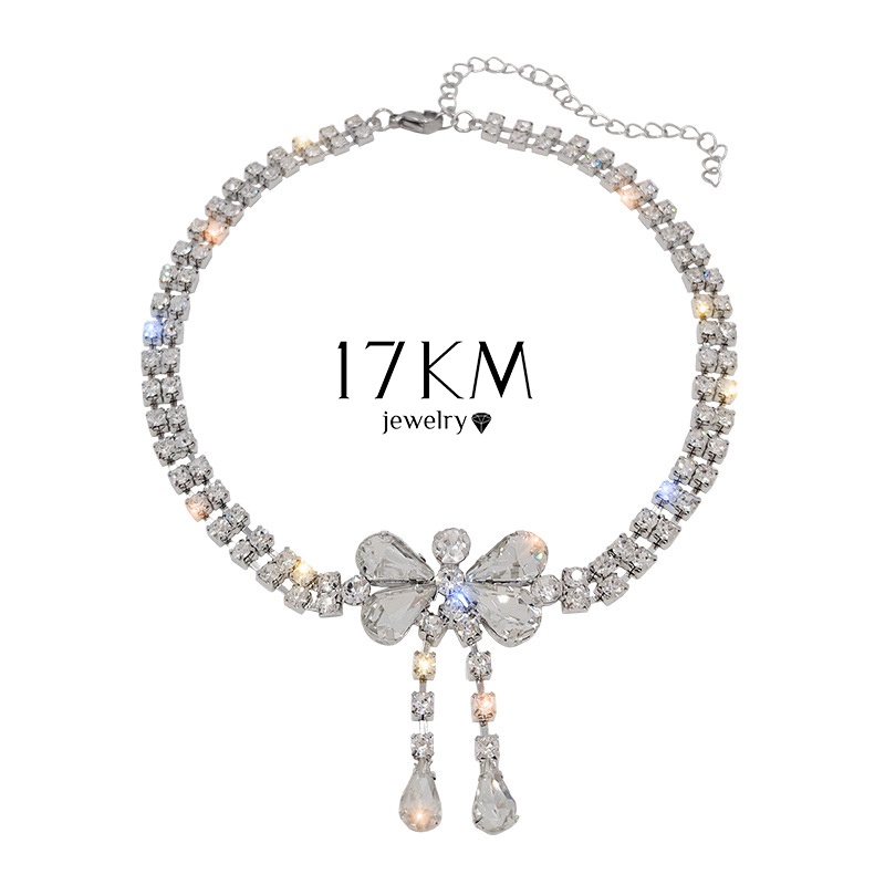 Vòng cổ 17KM mạ bạc mặt nơ tua rua đính đá zircon sang trọng