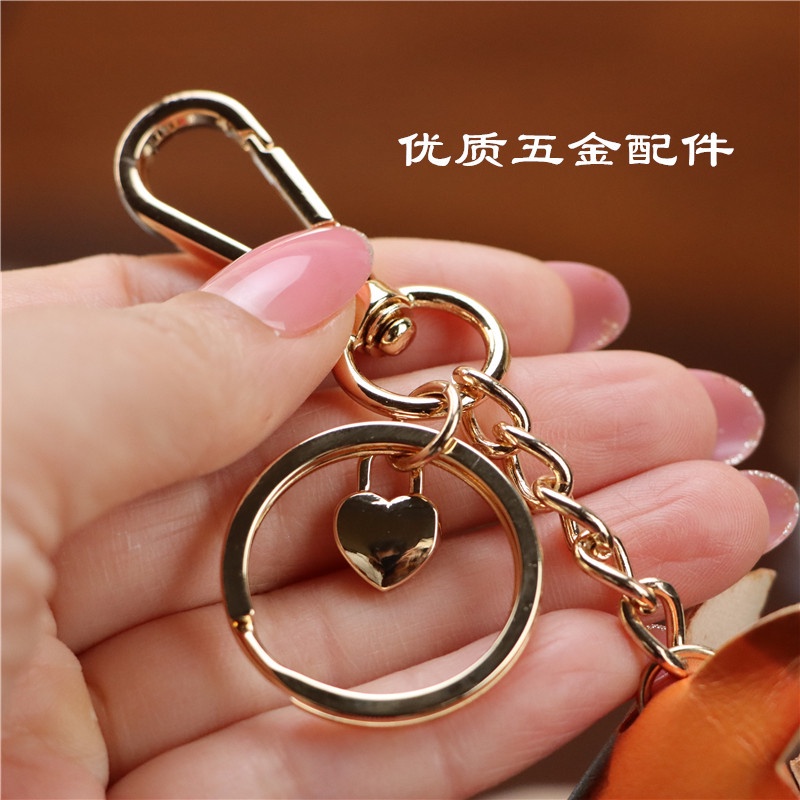 Móc Khóa Dây Da Bò Nhiều Lớp Trang Trí Hình Cung Hoàng Đạo
