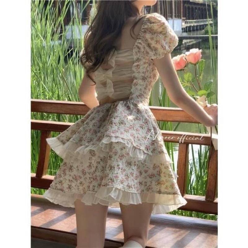 Đầm Hoa Mùa Hè Cao Cấp Khoét Lưng Đính Nơ Cho Bé Gái