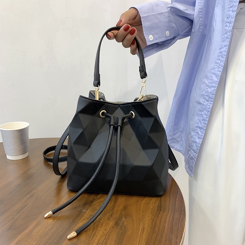 Túi Đeo Chéo Vai Kiểu Dây Rút Họa Tiết Hình Học Màu Sắc Thời Trang Sành Điệu Cho Nữ