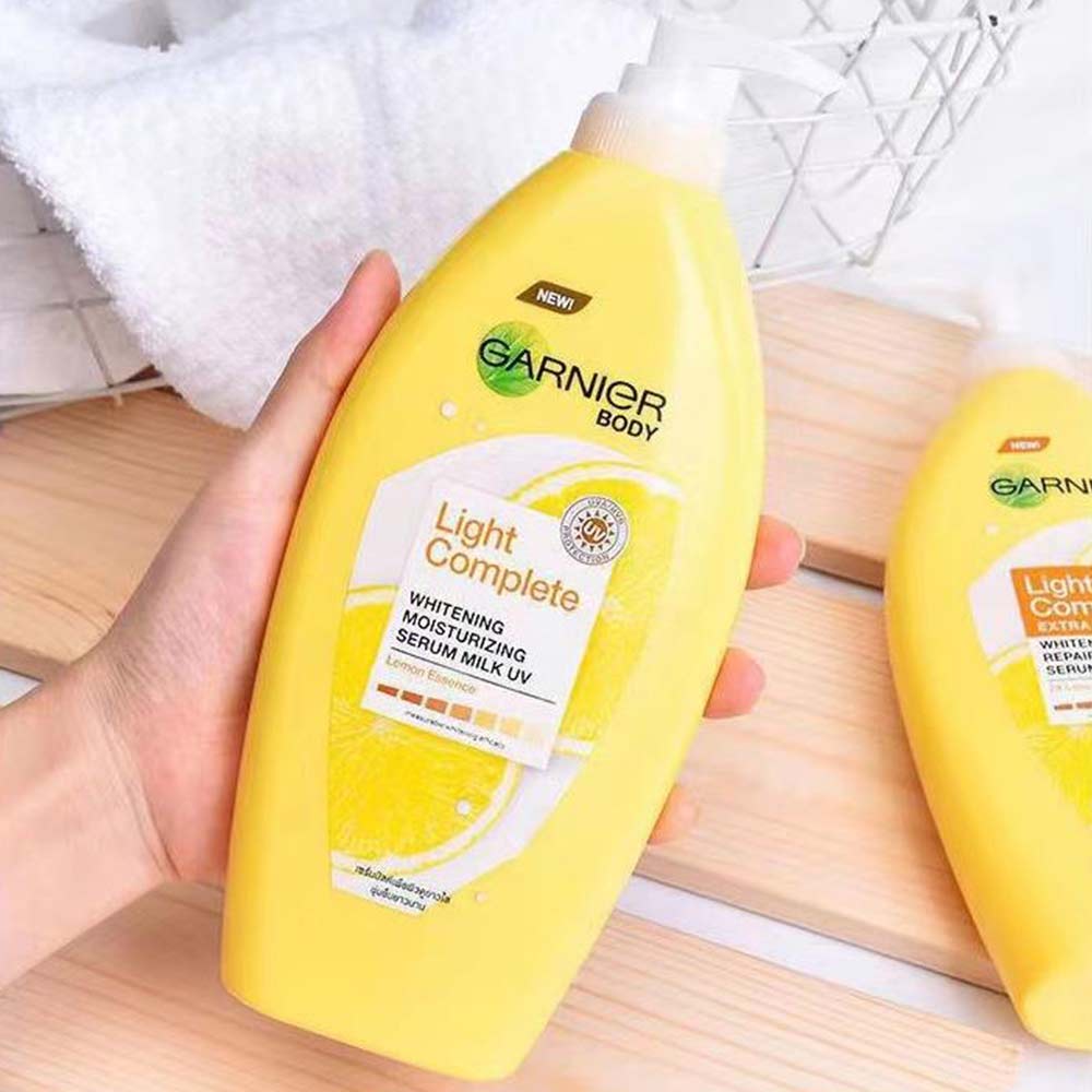 Garnier Light Complete Extra Whitening Repairing Serum Milk Uv Body Lotion 400ml