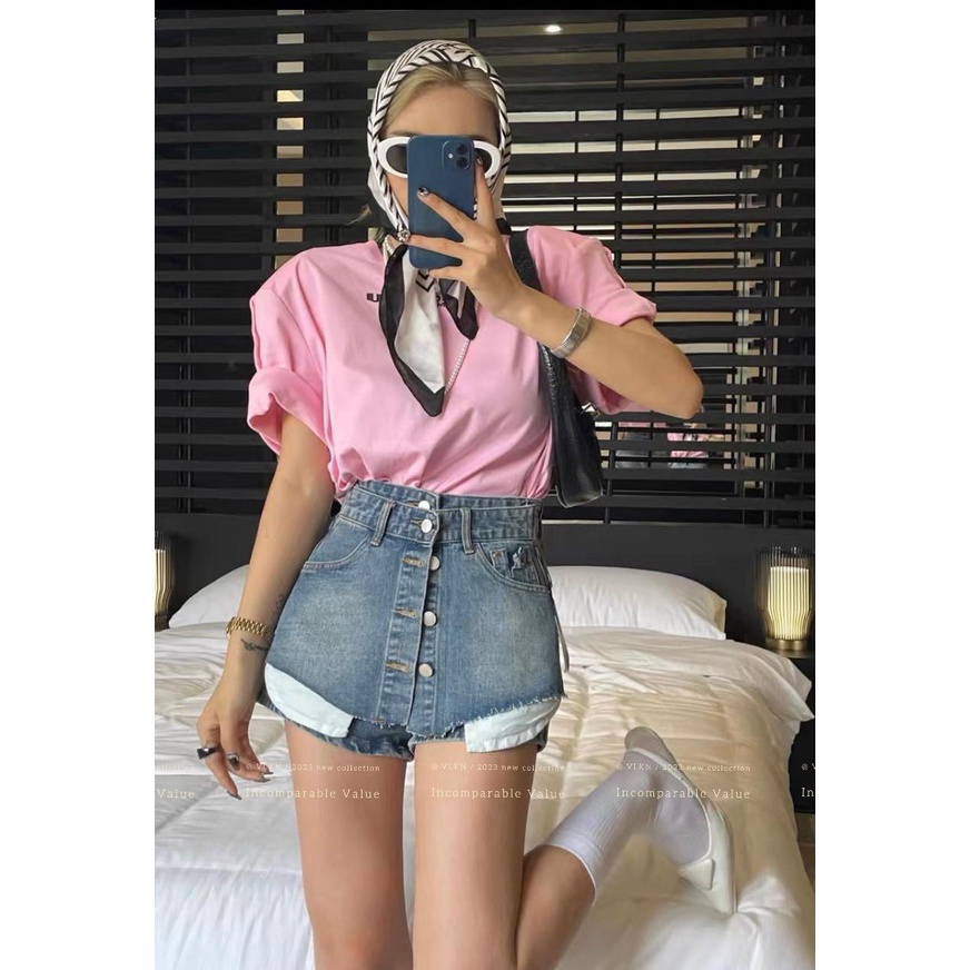 Quần váy je.an nút túi lộ