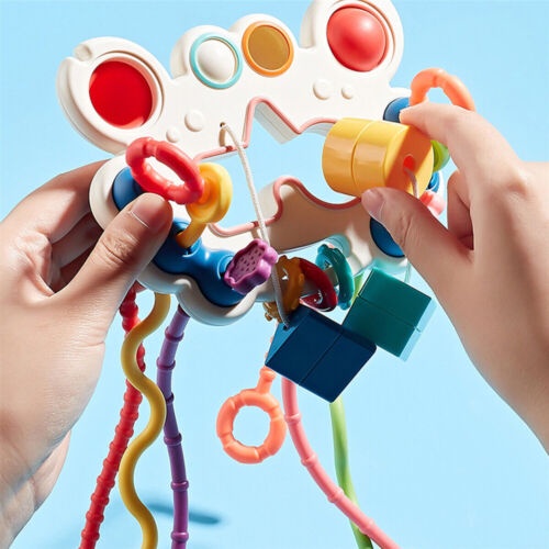 Đồ Chơi Dây Kéo Bằng Silicone Giúp Bé Mọc Răng