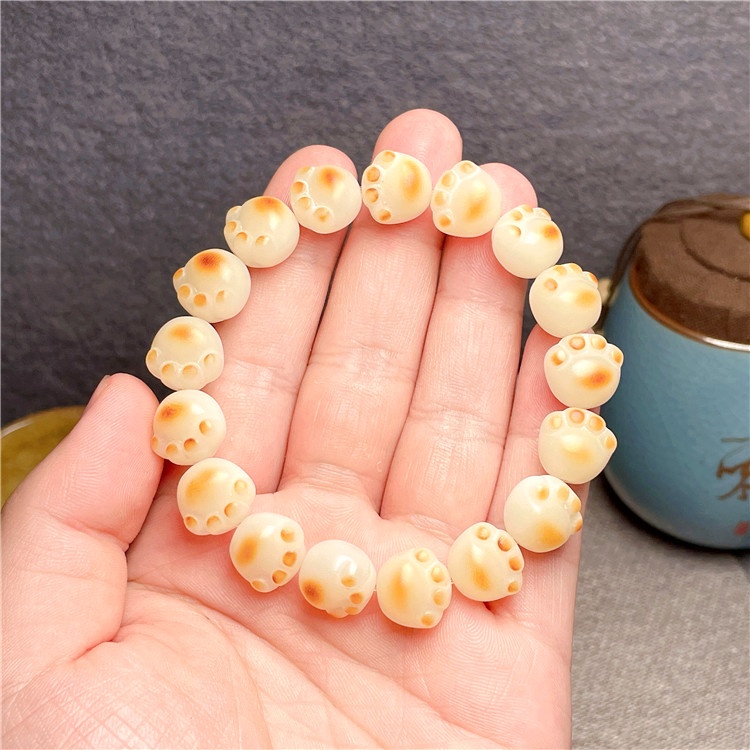 Vòng Tay Chuỗi Hạt Phật Giáo Bằng Nhựa Hình Bàn Chân Mèo