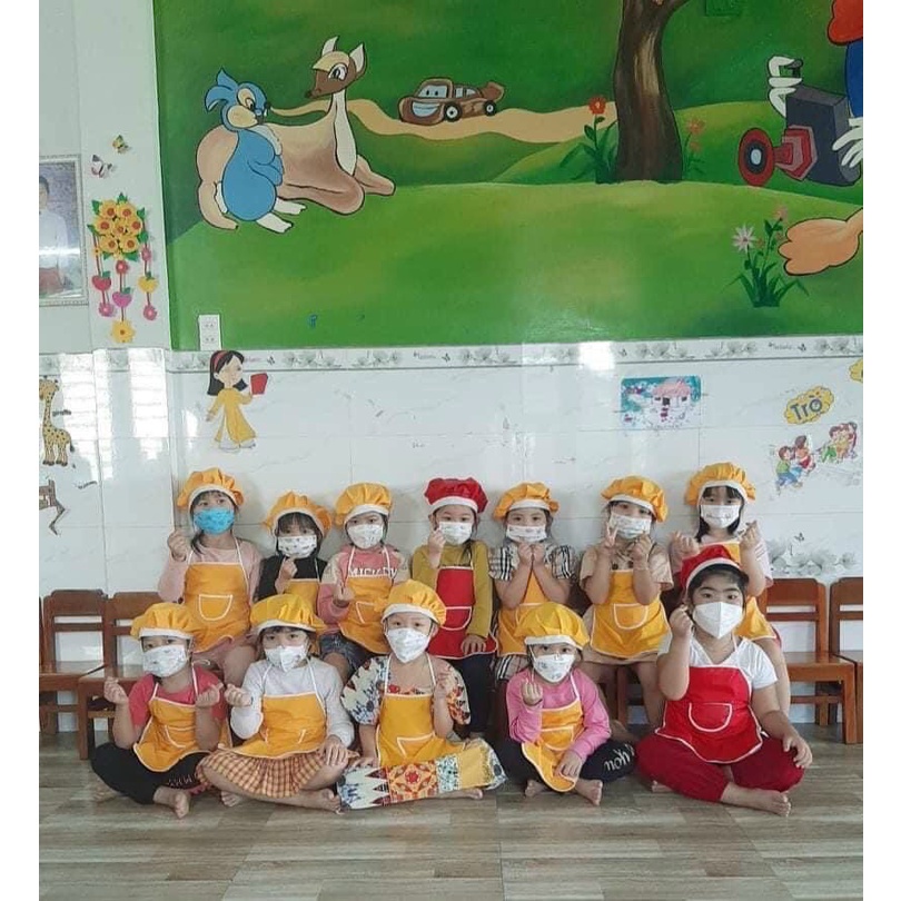 Tạp dề và mũ cho bé có 7 màu chất liệu 2 lớp kèm mũ