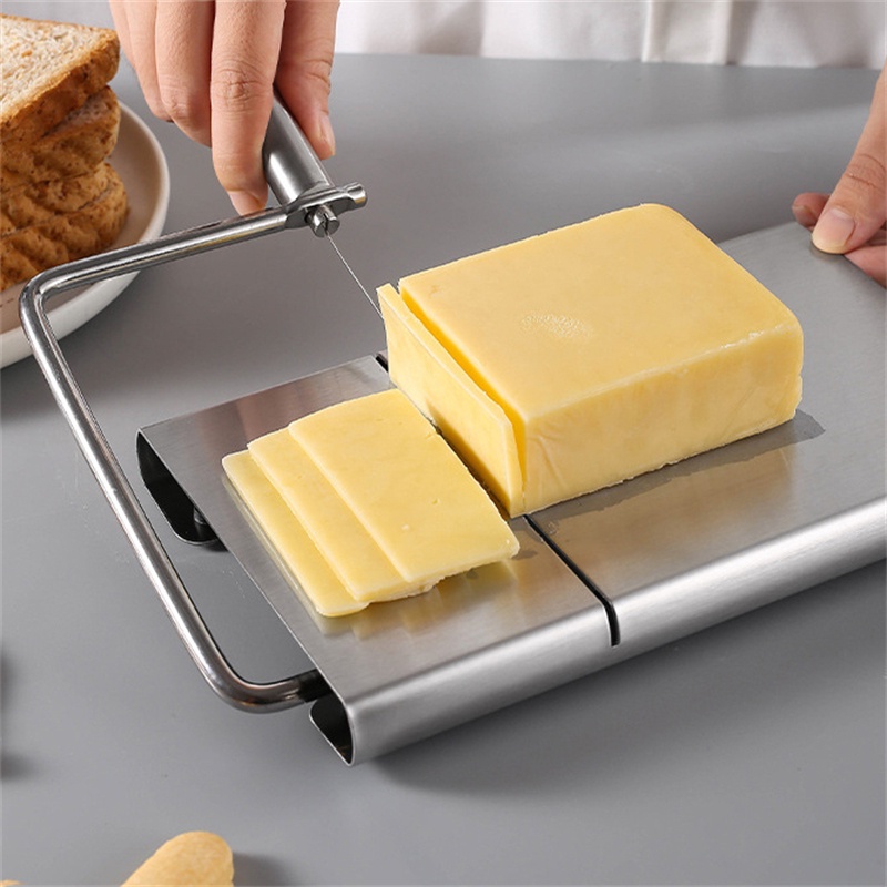 1 Dụng Cụ Cắt Phô Mai Tiện Lợi