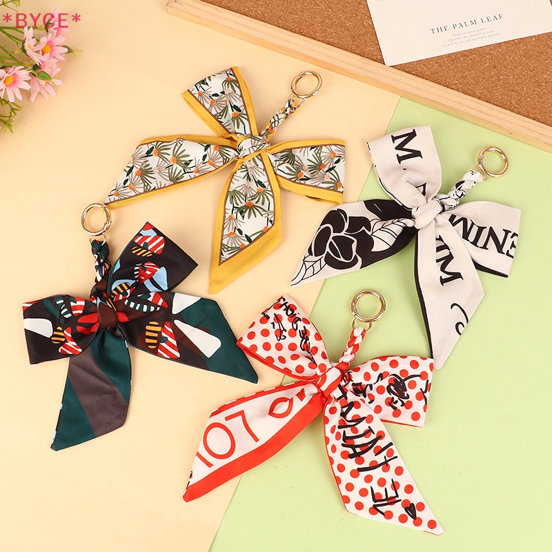 Móc Khóa Hình Nơ Bằng Lụa Mềm Mại Xinh Xắn Mới