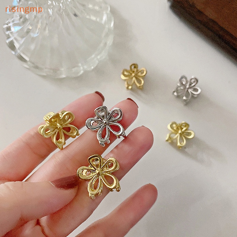 Set 2 Kẹp Tóc Càng Cua Mini Bằng Kim Loại Rỗng Hình Hoa Thời Trang Ngọt Ngào Cho Nữ
