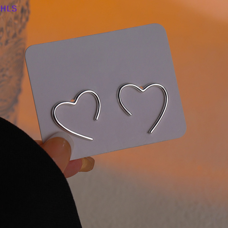 Khuyên Tai Kim Loại Hình Trái Tim Dạng Kẹp Chữ C Đơn Giản Dành Cho Nữ