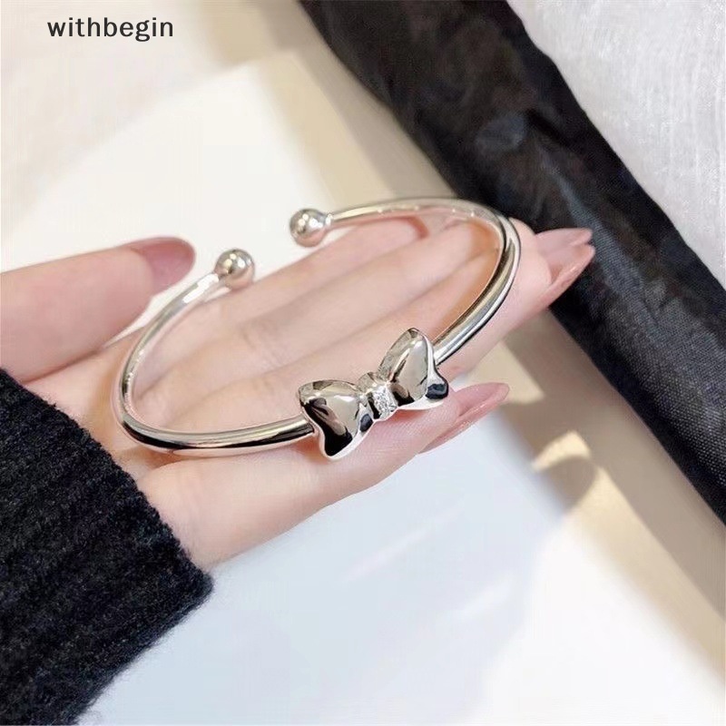 Vòng Đeo Tay Dạng Hở Màu Bạc Điều Chỉnh Được Phối Nơ Thời Trang Cho Nữ