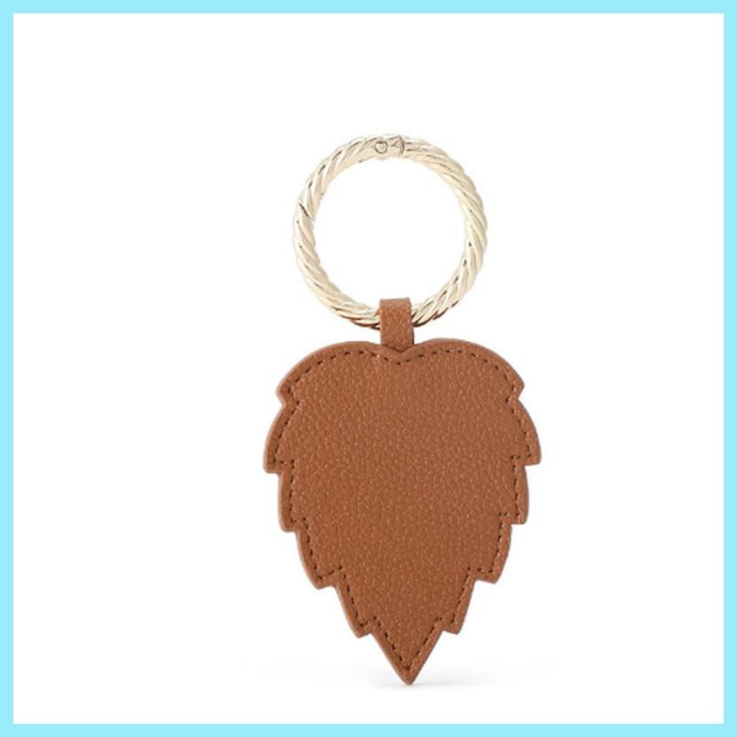 Kẹp Nón Da PU Hình Chiếc Lá Hít Nam Châm Đơn Giản Và Bền tdevn tdevn