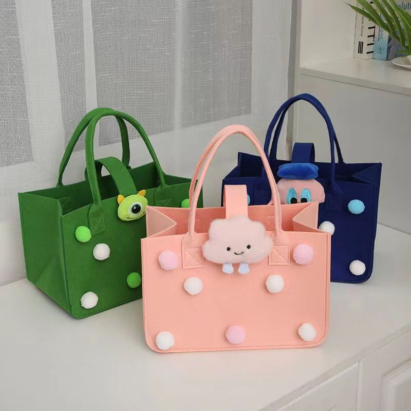 Phim hoạt hình phim hoạt hình túi nỉ one-year-old túi xách lưu niệm cho bé hàng tháng túi lưu niệm diy felt gift bag bán buôn