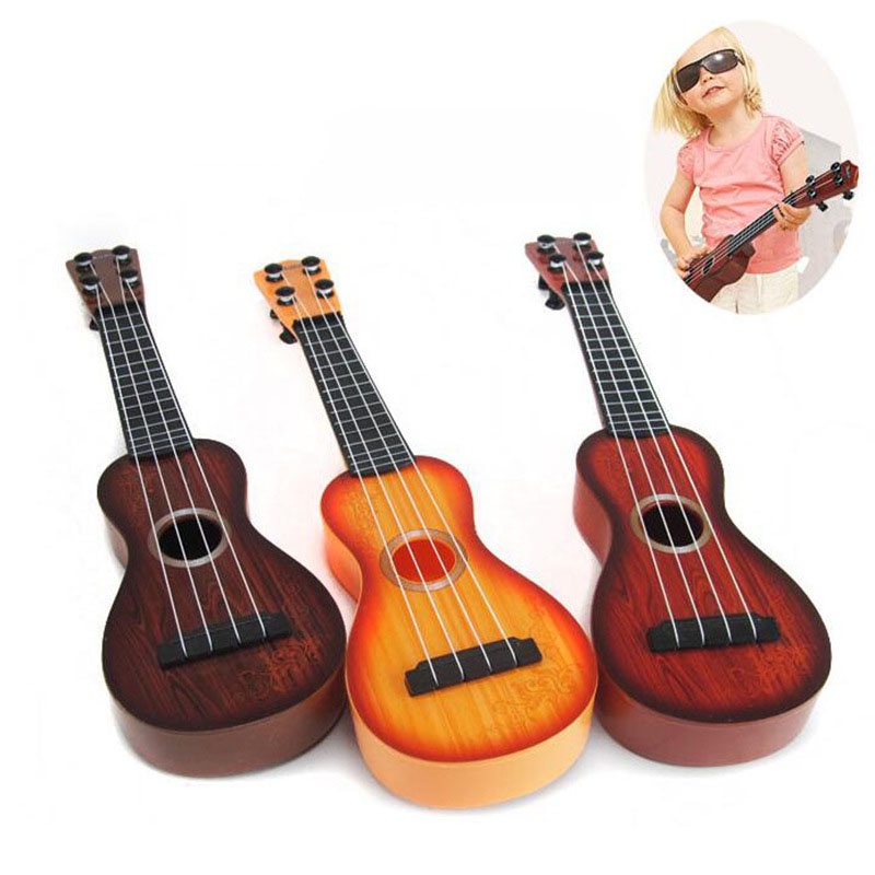 Đàn Ukulele Mini Bằng Gỗ Kèm Hộp Màu Sắc Xinh Xắn Dành Cho Bé
