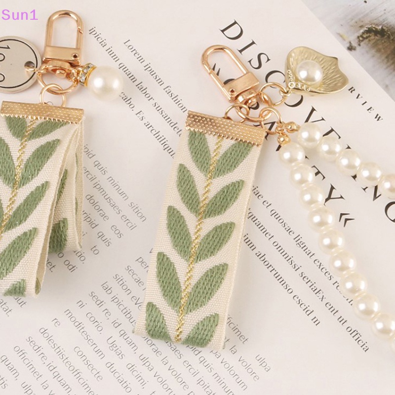 Sun1> mô hình lá thanh lịch vòng tay móc khóa mặt dây chuyền vỏ ngọc trai dễ thương có dây đeo và dây đeo cho nữ chìa khóa điện thoại ví trang trí tốt