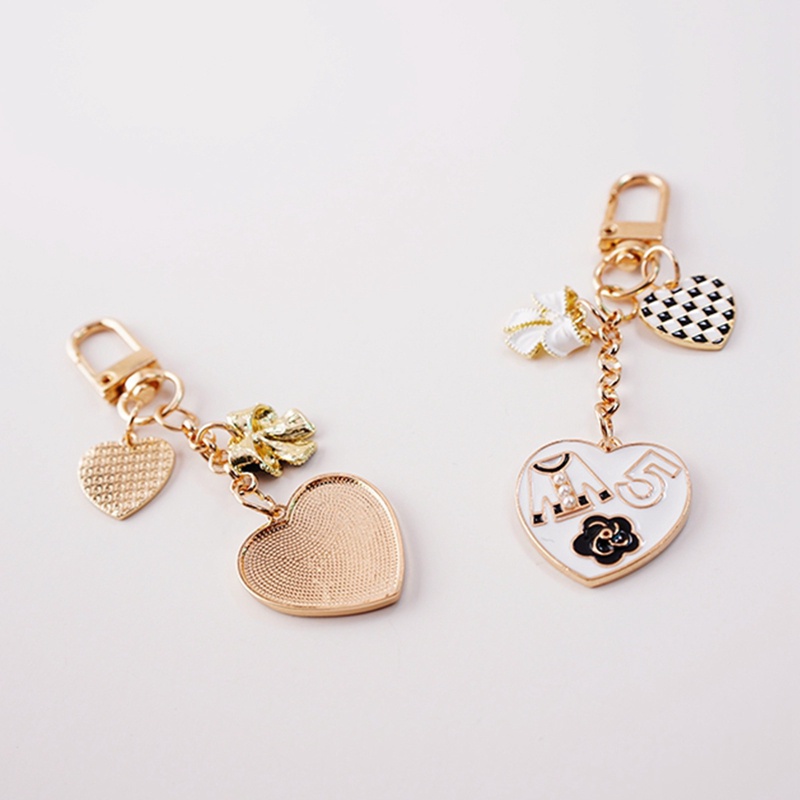 Móc Khóa Mạ Bạc Hình Trái Tim Đính Nơ Xinh Xắn