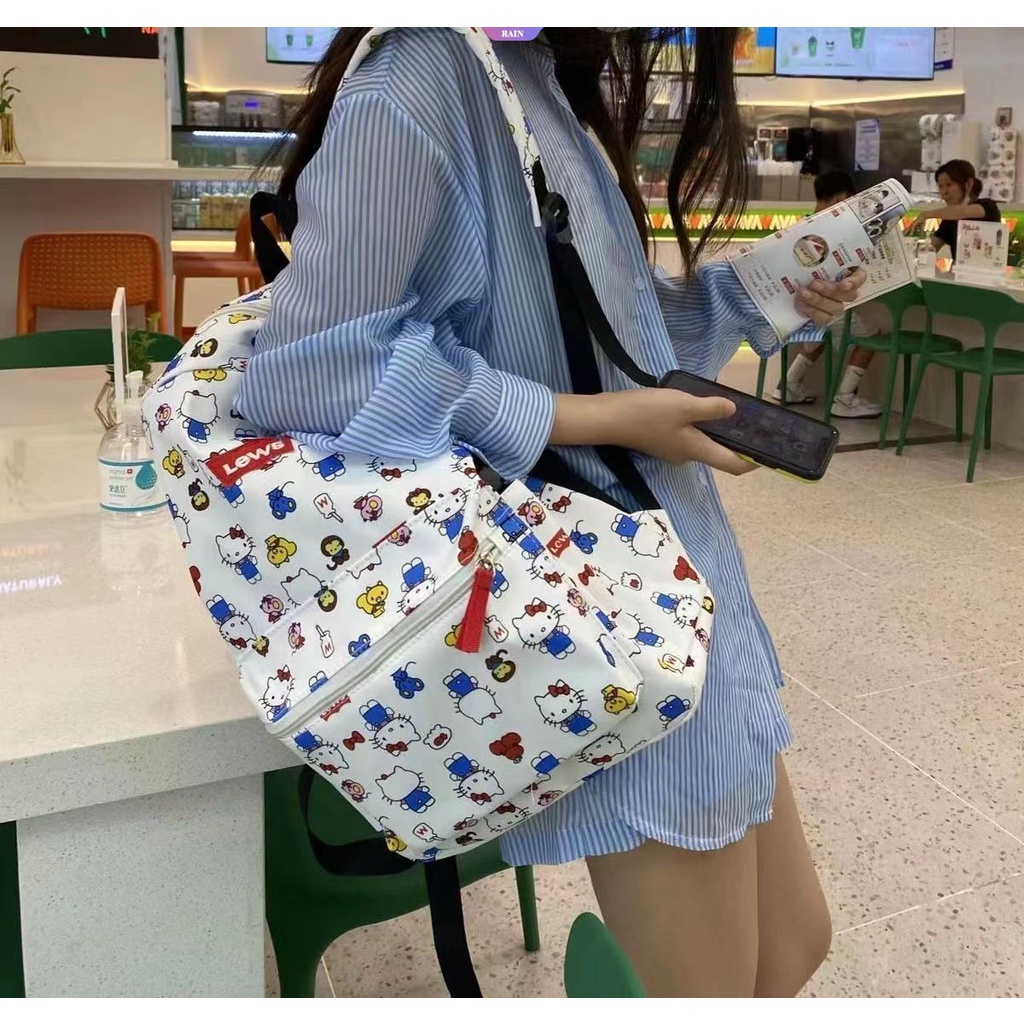 Ba Lô Vải Canvas Nylon Sức Chứa Lớn In Hình Sanrio Hello Kitty Dễ Thương Có Khóa Kéo Thời Trang Cho Nữ