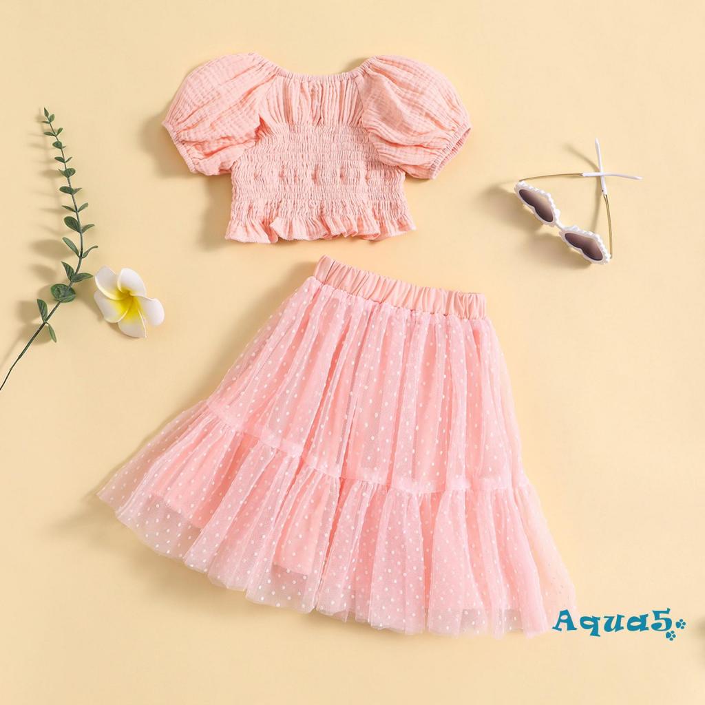 Set Áo Croptop Tay Ngắn + Chân Váy Xếp Ly Chấm Bi Xinh Xắn Cho Bé Gái