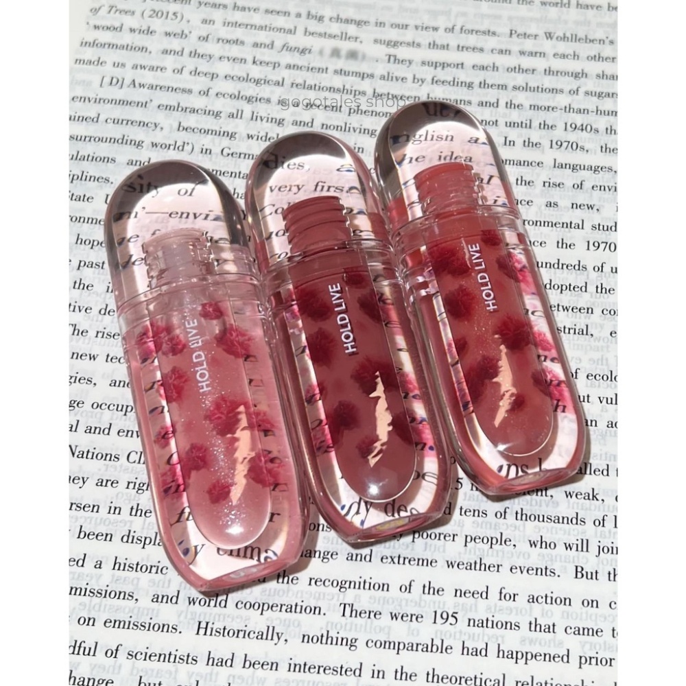 Son bóng Hold Live Wild Flower HL676 mềm môi căng mọng hương đào ngọt ngào chất son gel dưỡng ẩm hiệu ứng bling bling
