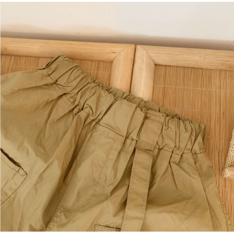 Quần short dù rút dây cá tính cho bé