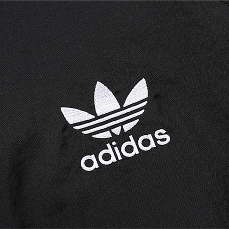 Thêu logo adidas áo gió ngoài trời ban đầu áo gió đứng cổ áo áo gió unisex áo gió thông thường