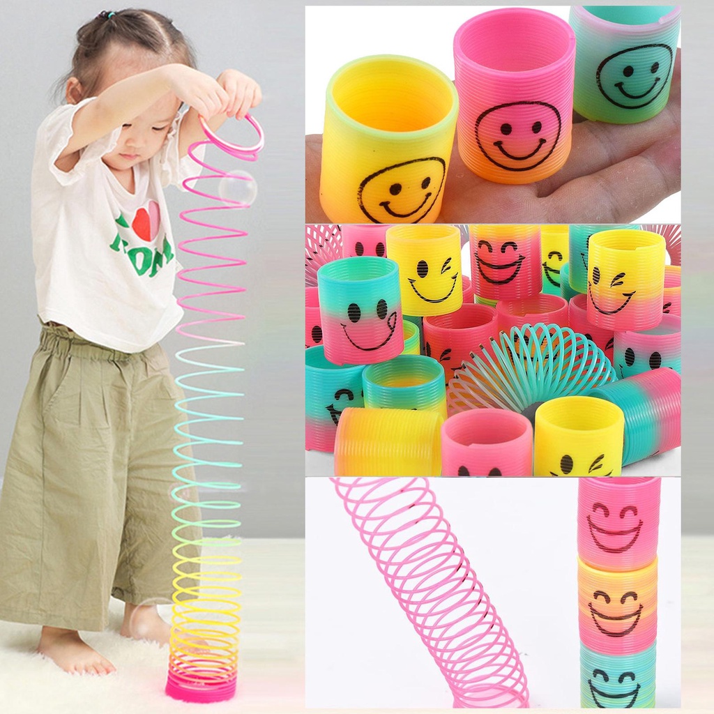 Đồ Chơi Lò Xo Tròn Mini Bằng Nhựa Hình Mặt Cười Màu Cầu Vồng Cho Bé E7I3